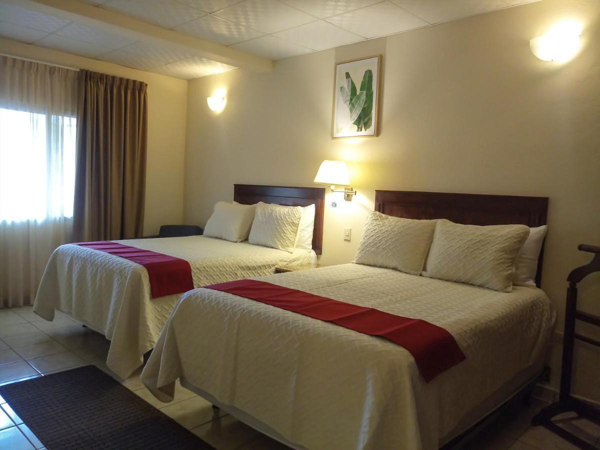 Real Guanacaste Aparthotel San Pedro Sula Buitenkant foto
